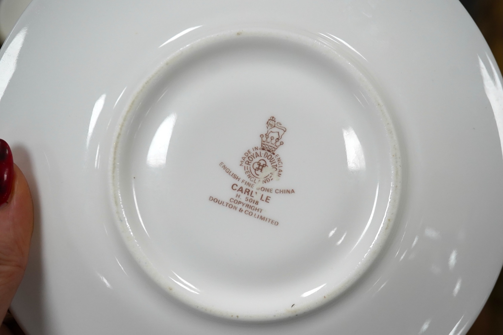 A Royal Doulton Carlyle pattern part dinner and tea service. Condition - appears good